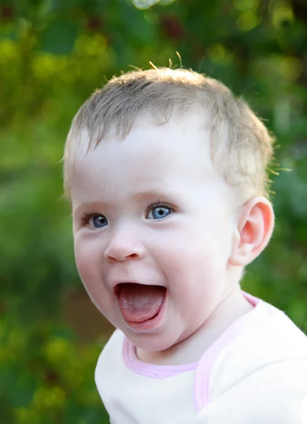 Happy laughing baby outdoor — Stock Photo, Image