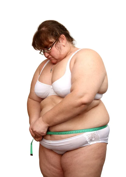 Overweight woman measure her stomach — Stock Photo, Image
