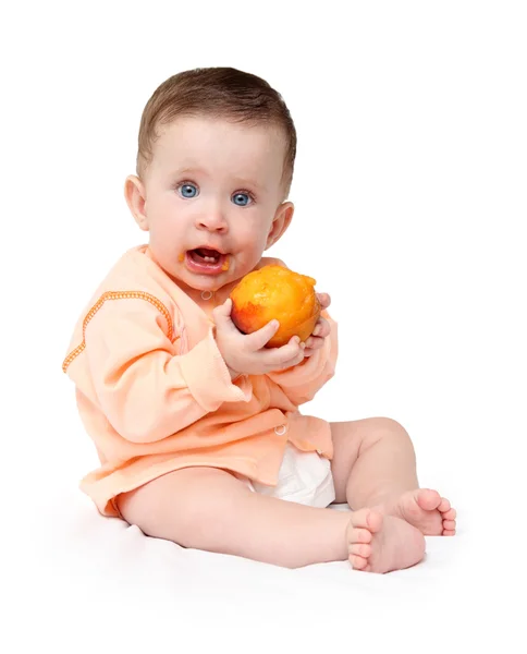 Baby eten perzik — Stockfoto