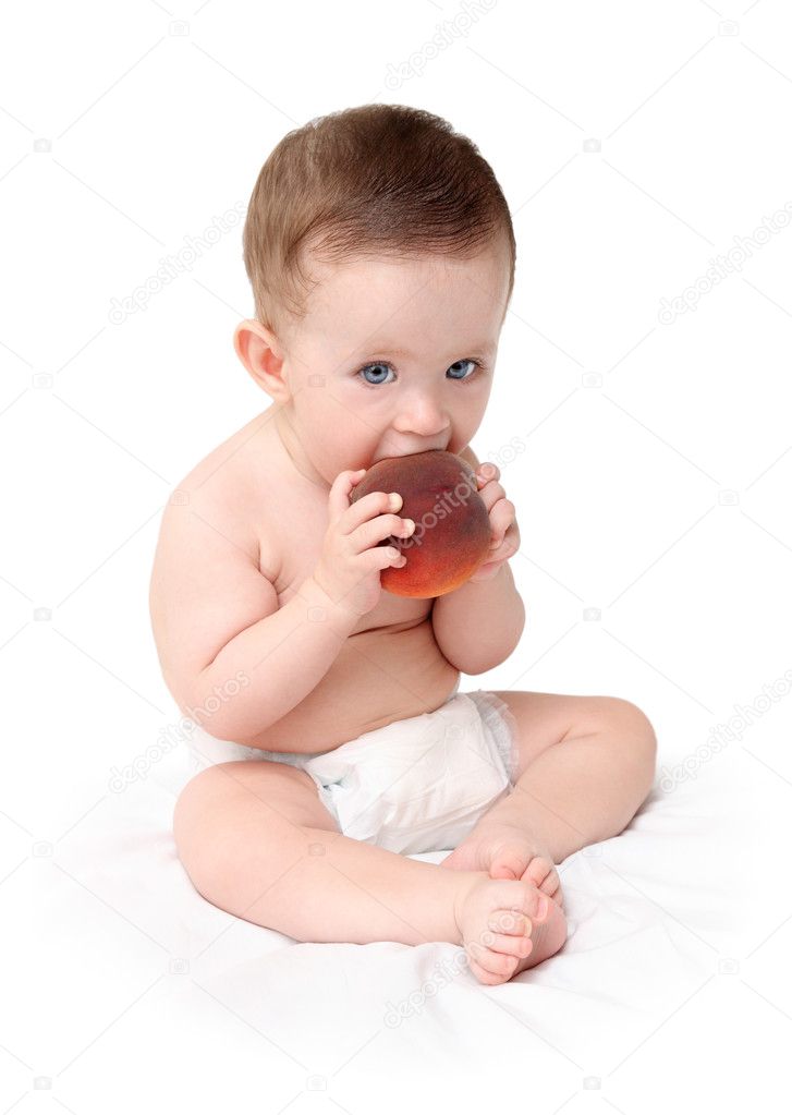 Baby eating peach — Stock Photo © Kokhanchikov 2942909