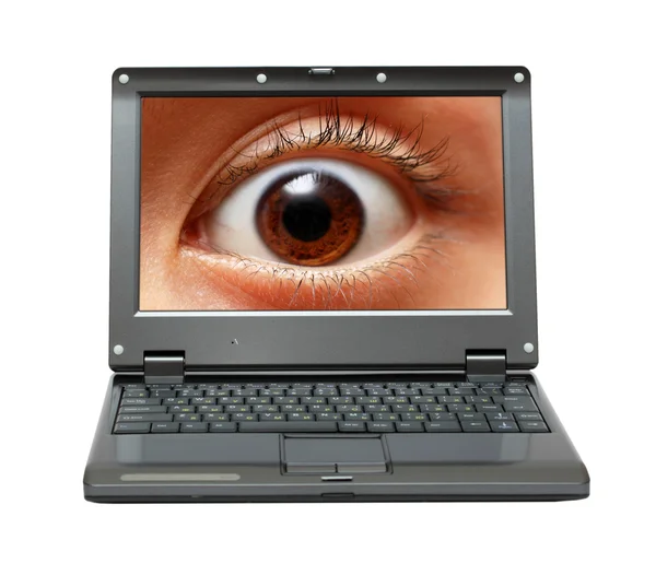 Pequeño portátil con ojo en la pantalla — Foto de Stock