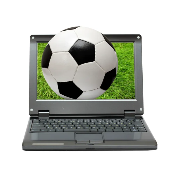 Pequeno laptop com bola de futebol — Fotografia de Stock