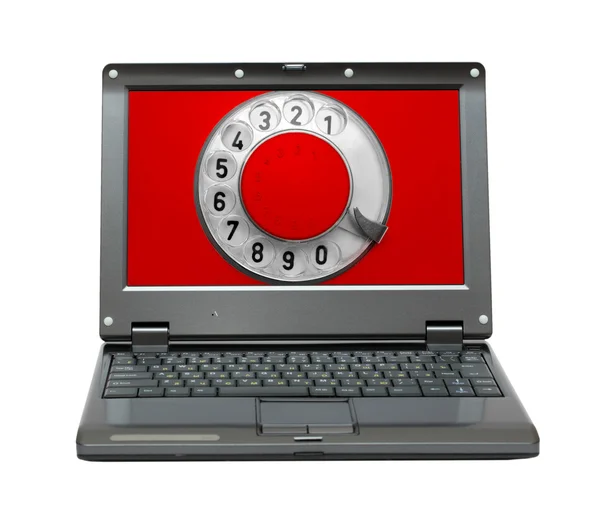 Laptop con vecchio quadrante del telefono — Foto Stock