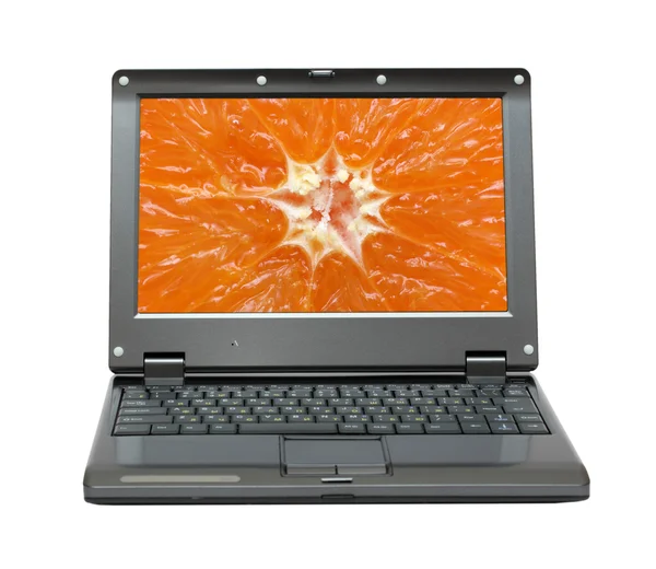 笔记本电脑与橙柑橘背景 — 图库照片