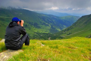 Man with binoculars clipart