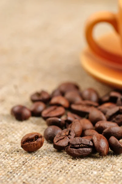 Coffee beans on the bagging — Stock Photo, Image