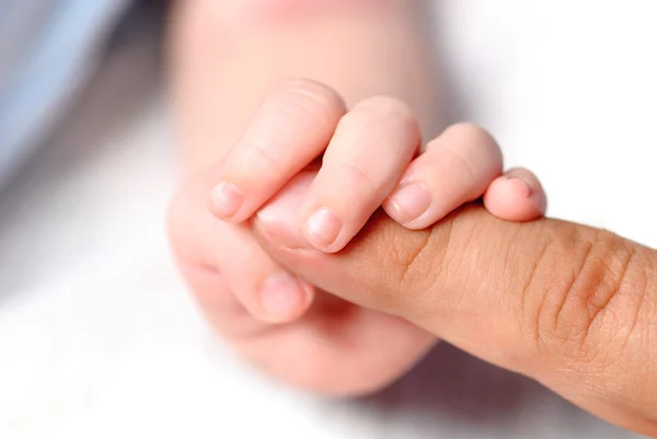 Hand of son — Stock Photo, Image