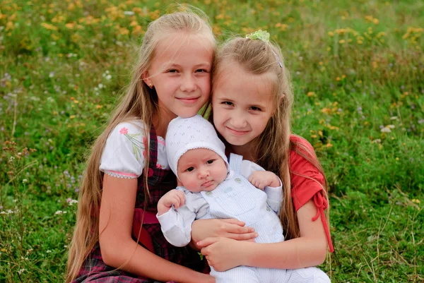 Two sisters and brother — Stock Photo, Image