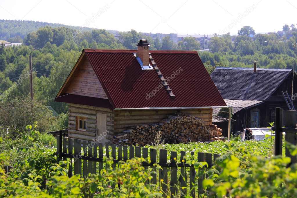 Old village house in sunny day