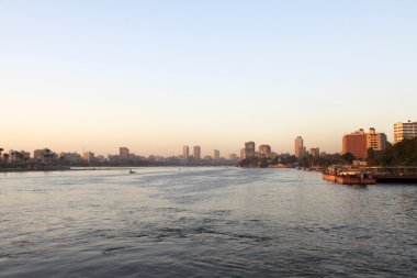 Sunset Cairo from the river Nile bridge clipart