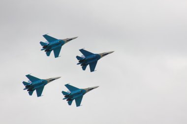 Russian fighter in the sky on MAKS aviashow clipart