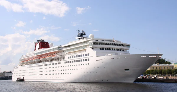 Luxury white cruise ship shot at angle at water level — Stock Photo, Image