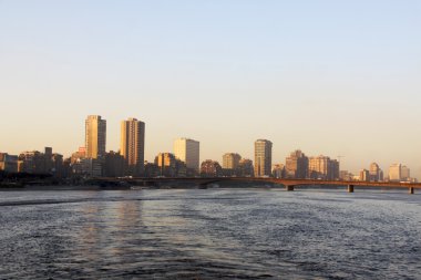 Sunset Cairo from the river Nile bridge clipart