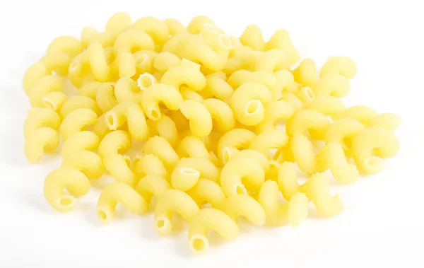 Close up of raw italian pasta on white — Stock Photo, Image
