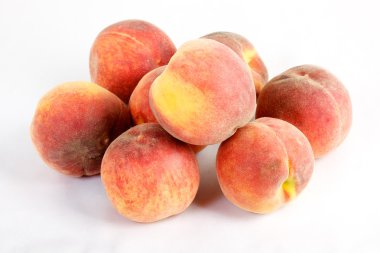 Fresh peaches - isolated on white