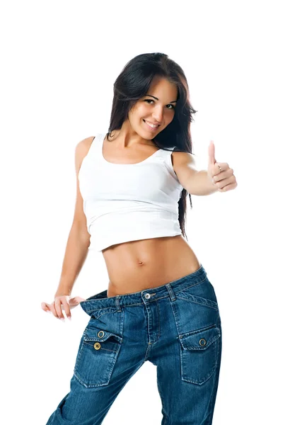 Mooi meisje demonstreren van verlies van het gewicht — Stockfoto