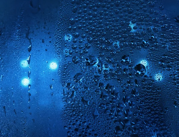 Waterdruppels en licht — Stockfoto