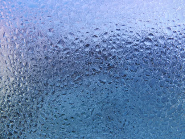 Frostat vattendroppar på glas — Stockfoto
