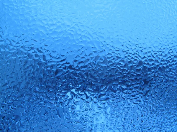 Natürliche Wassertropfen auf Glas — Stockfoto