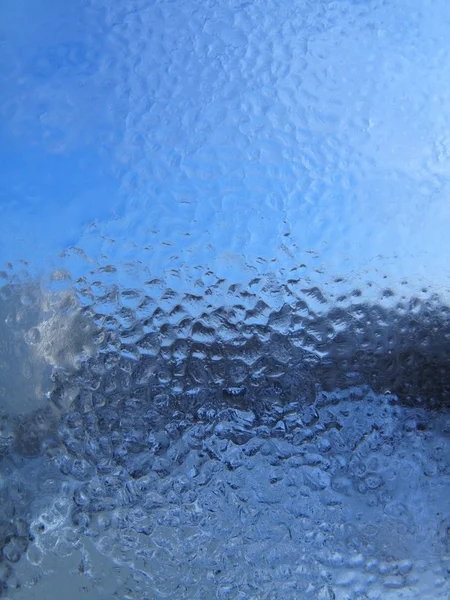 Краплі води і морозна текстура — стокове фото