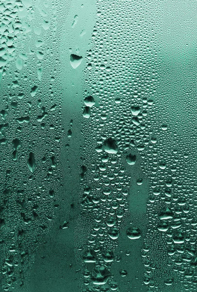Naturliga vattendroppar på glas — Stockfoto
