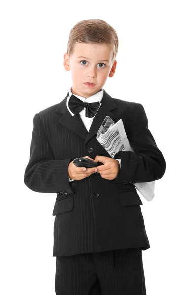 男孩抱着一个手机和报纸 — 图库照片
