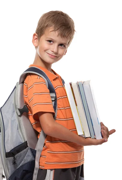 Junge hält Bücher in der Hand — Stockfoto