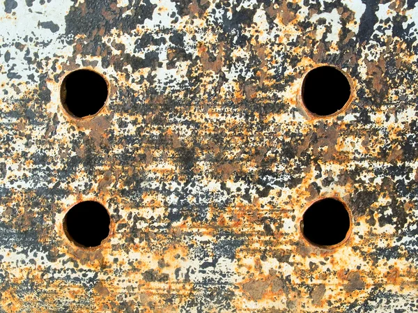 Placa de metal con agujeros. — Foto de Stock