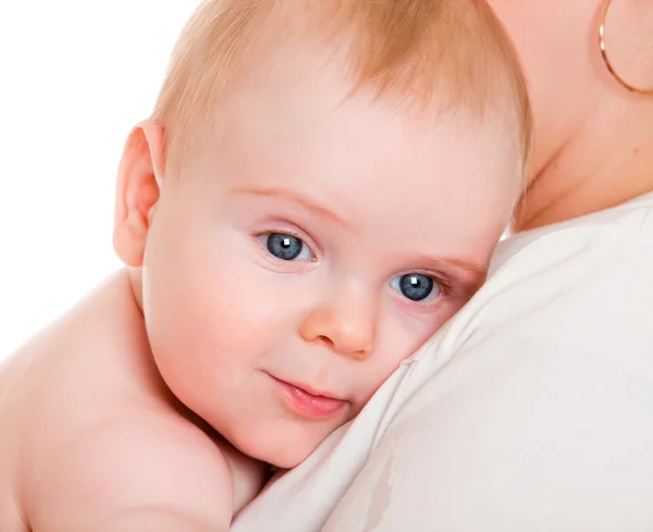 Baby on a shoulder at mum — Stock Photo, Image