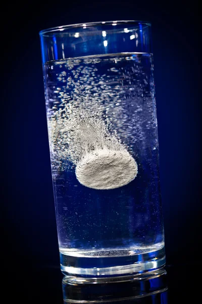 Tablet in a water glass — Stock Photo, Image