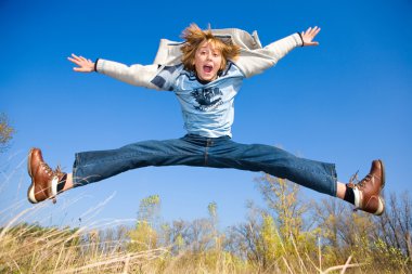 Happy jumping boy clipart