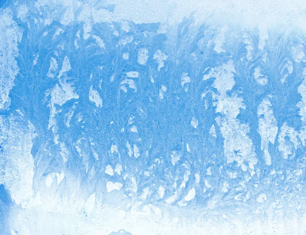 Frosty natuurlijke patroon op winter glas — Stockfoto