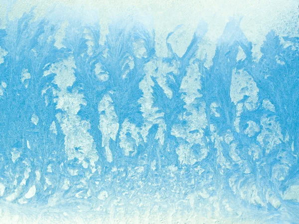 Frosty natural pattern on winter glass — Stock Photo, Image