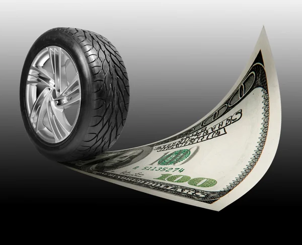 Roda com aro de aço. dinheiro, 100 dólares americanos — Fotografia de Stock