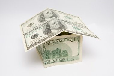 Money house, 100 american dollars. Soft focus. clipart