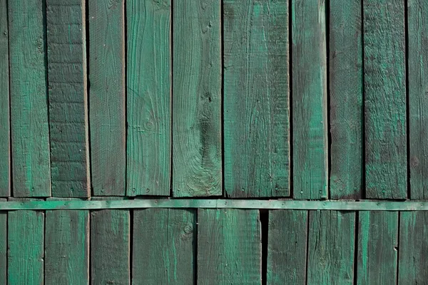 Oude houten muur van een groene tint — Stockfoto