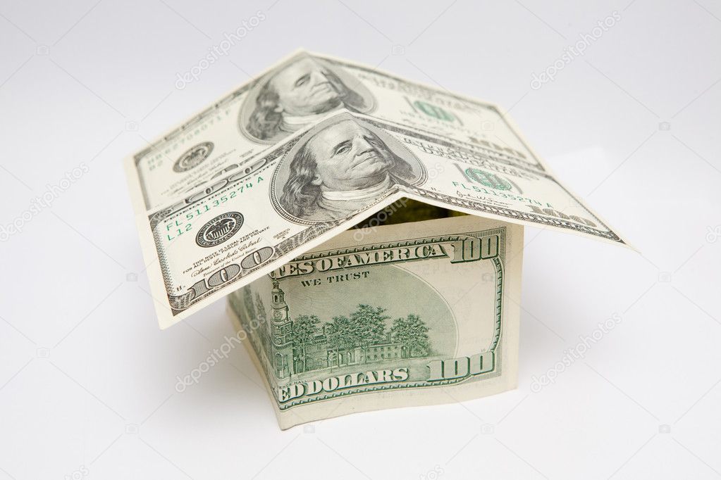 Money house, 100 american dollars. Soft focus.