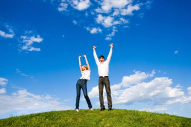 Happy young couple enjoying summer clipart