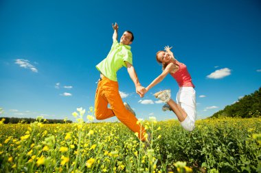 pretty child having fun in the field clipart