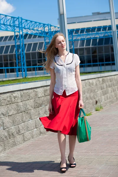 Smiling Sexy Blonde Girl Wearing Red Skirt Green Bag All — Stock Photo, Image