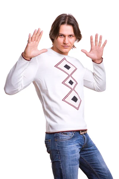 Young men dressed in modern clothes. In a sweater and jeans. — Stock Photo, Image