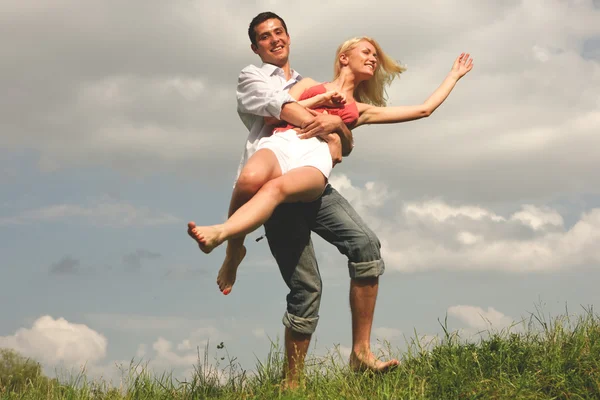 Happy Young Couple Jumping Sky Green Meadow — Stock Photo, Image