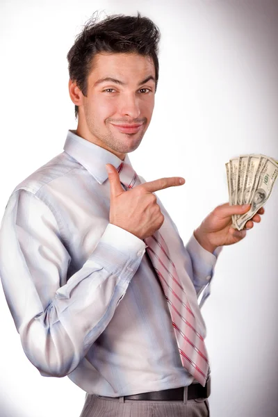 Uomo in possesso di denaro — Foto Stock
