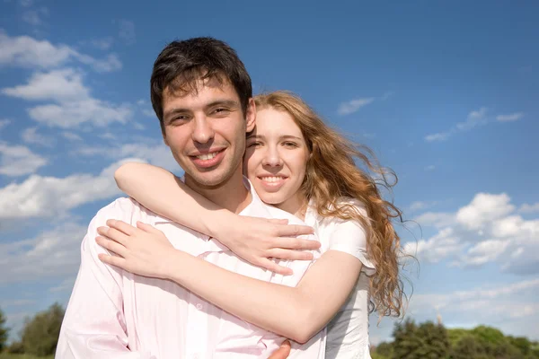 Happy smiling couple fly in sky — Stock Photo, Image