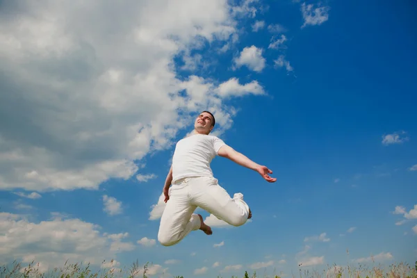Happy Young Man Jumping — Stock Photo, Image