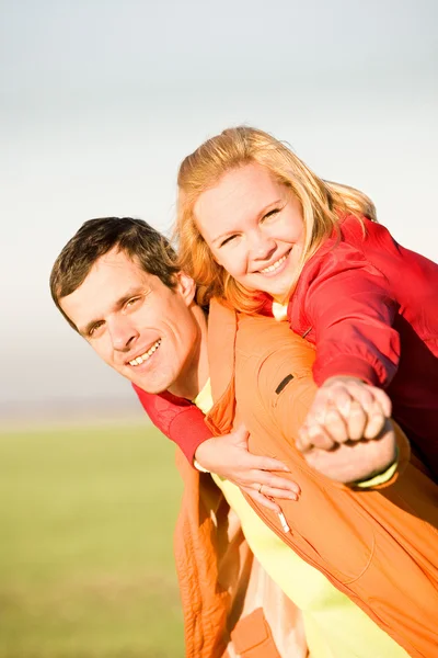 stock image Happy smiling couple fly in sky