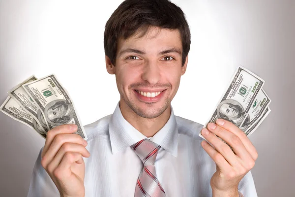 Hombre Sosteniendo Dinero Imagen De Stock
