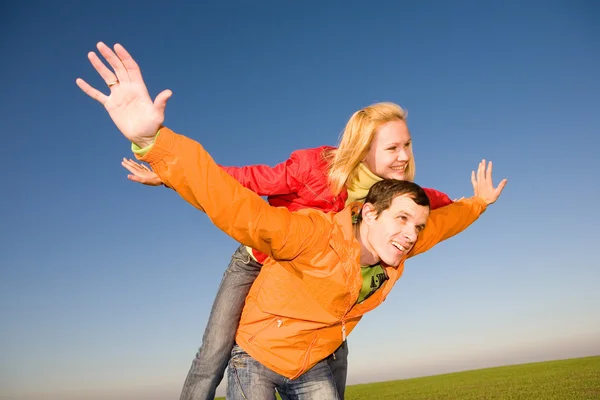 Young Love Couple Smiling Blue Sky Stock Image
