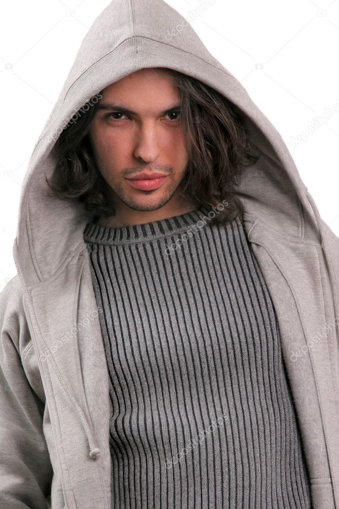 Portrait of young man dressed in modern clothes with a hood