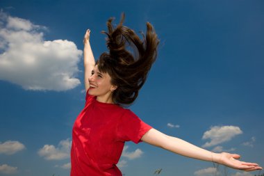 Girl in a field injoying summer clipart